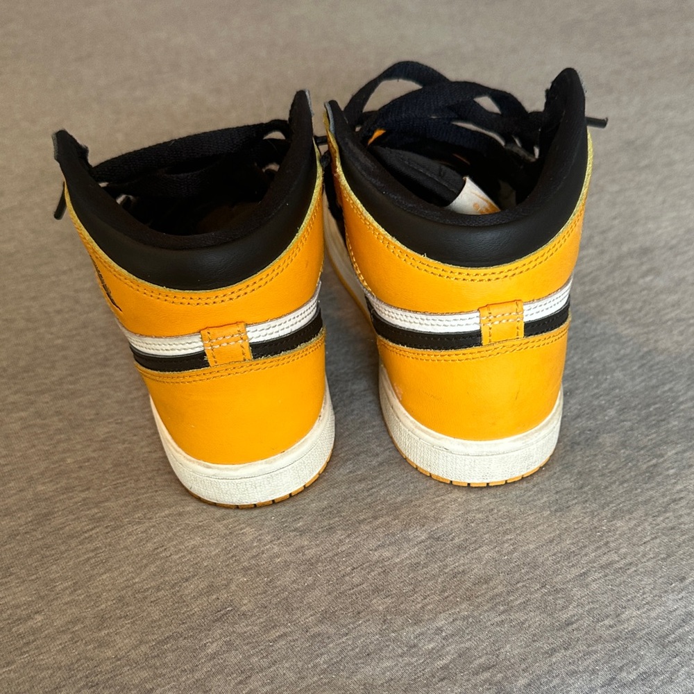 Nike Air Jordan Retro High Tops in Black, White, and Orange - Picture 3 of 11